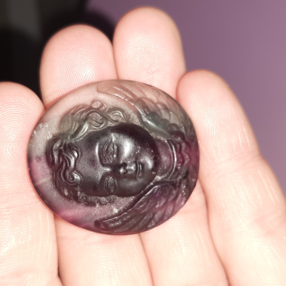 Rainbow fluorite angel Palmstone
